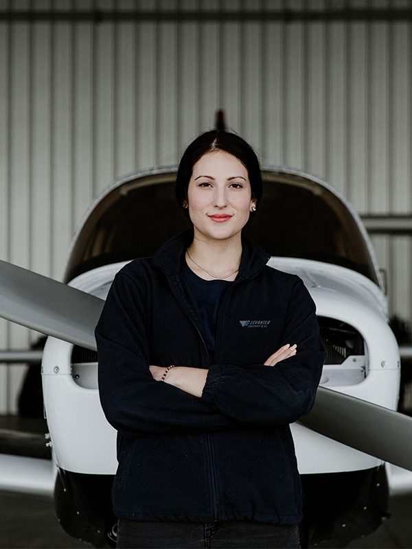 young-female-pilot-posing-78S434tq.jpg